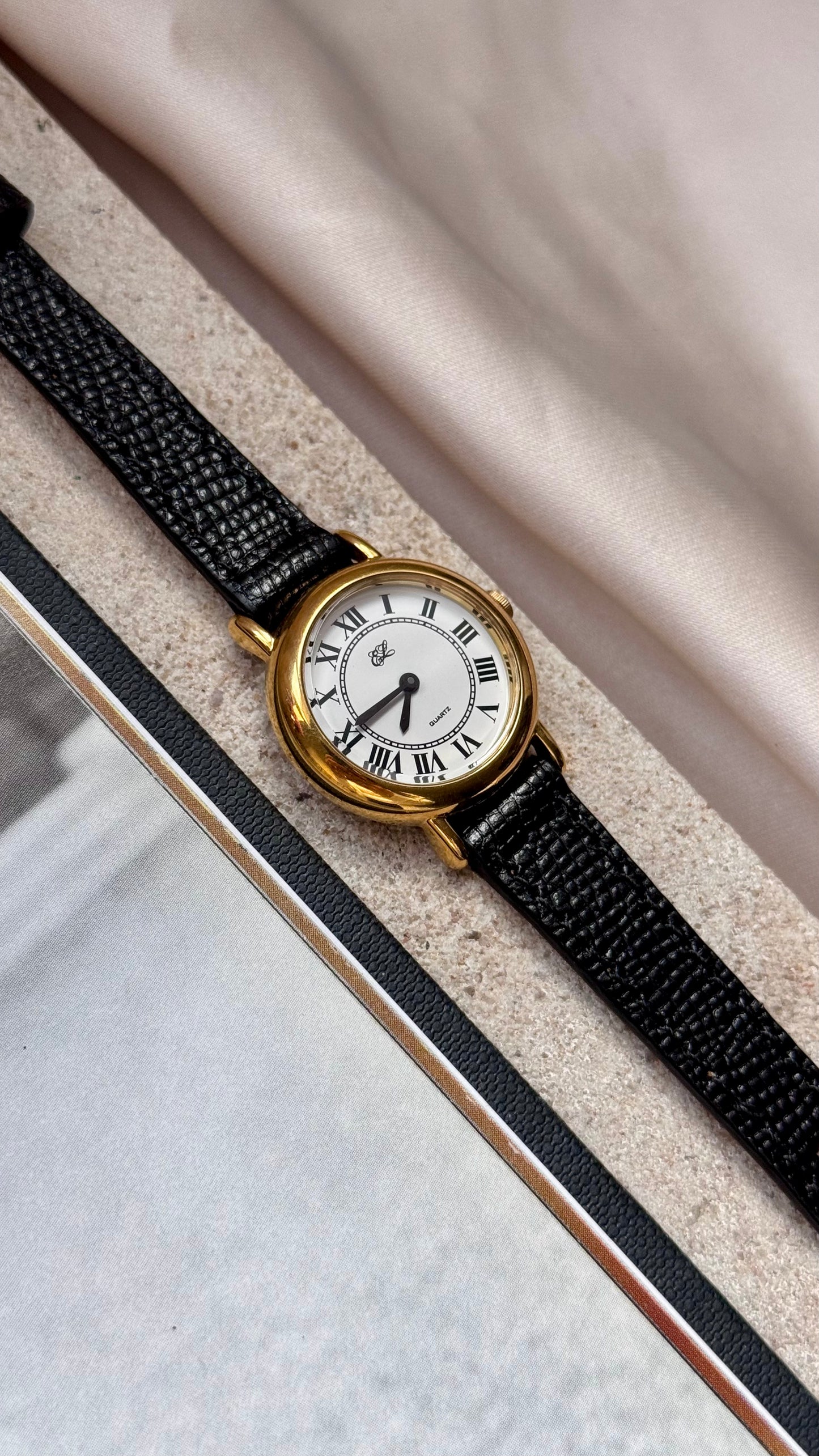 Estee Lauder vintage watch - Roman numerals, gold plated