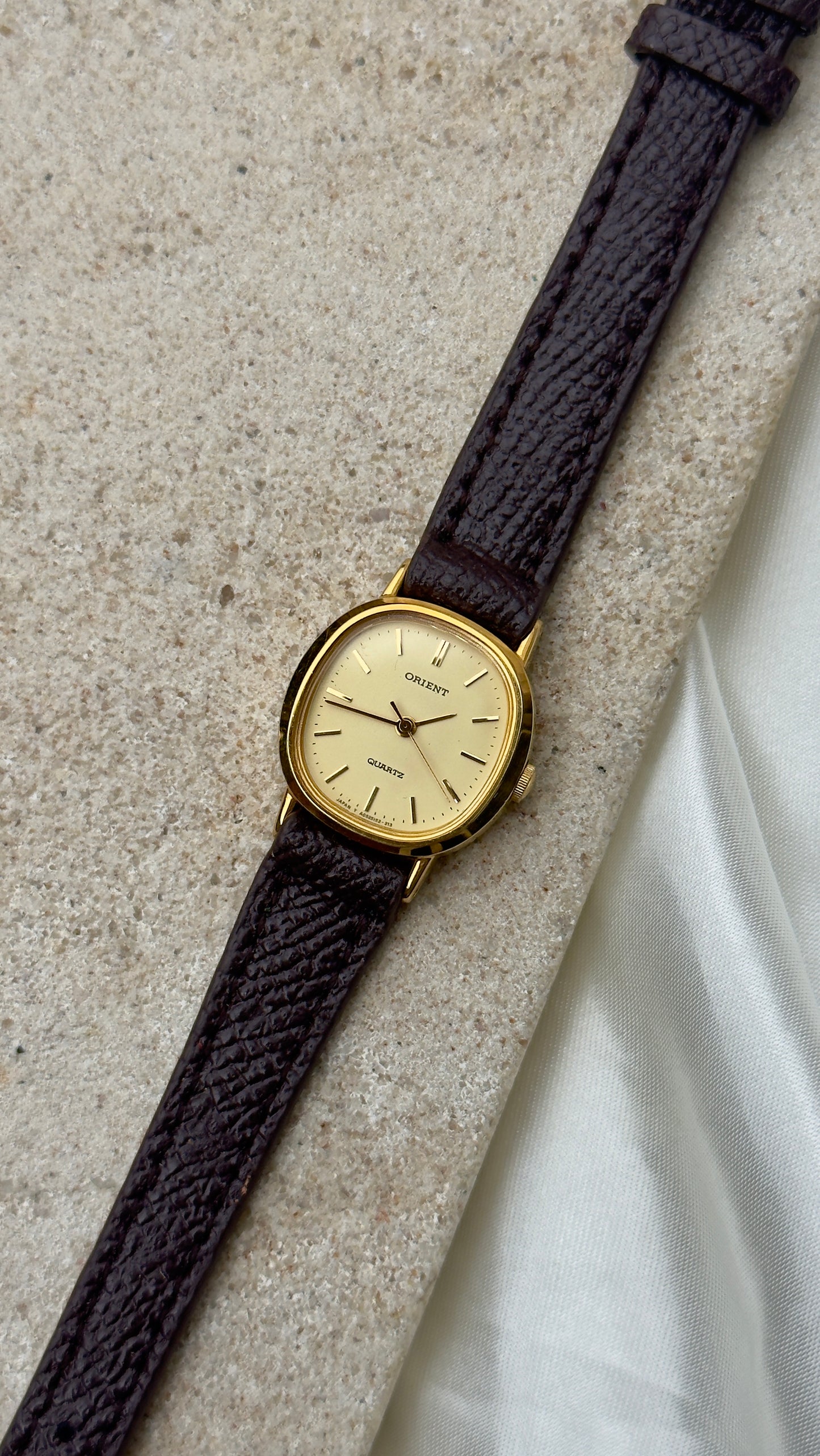 ORIENT Vintage Watch 1980s - cushioned case, gold plated, handmade leather