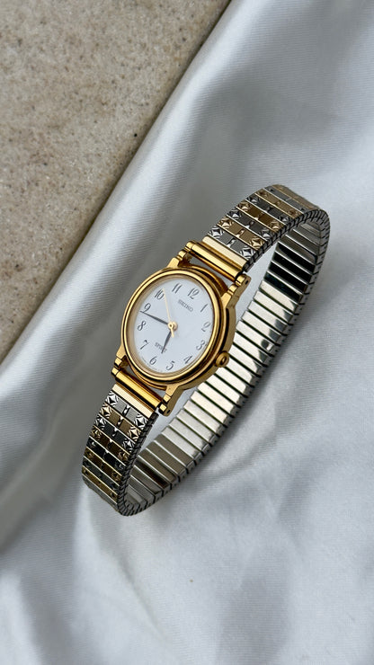 Seiko Spirit Vintage Watch 1996 - Oval Stepped Case  Black Dial with duo tone stretch band