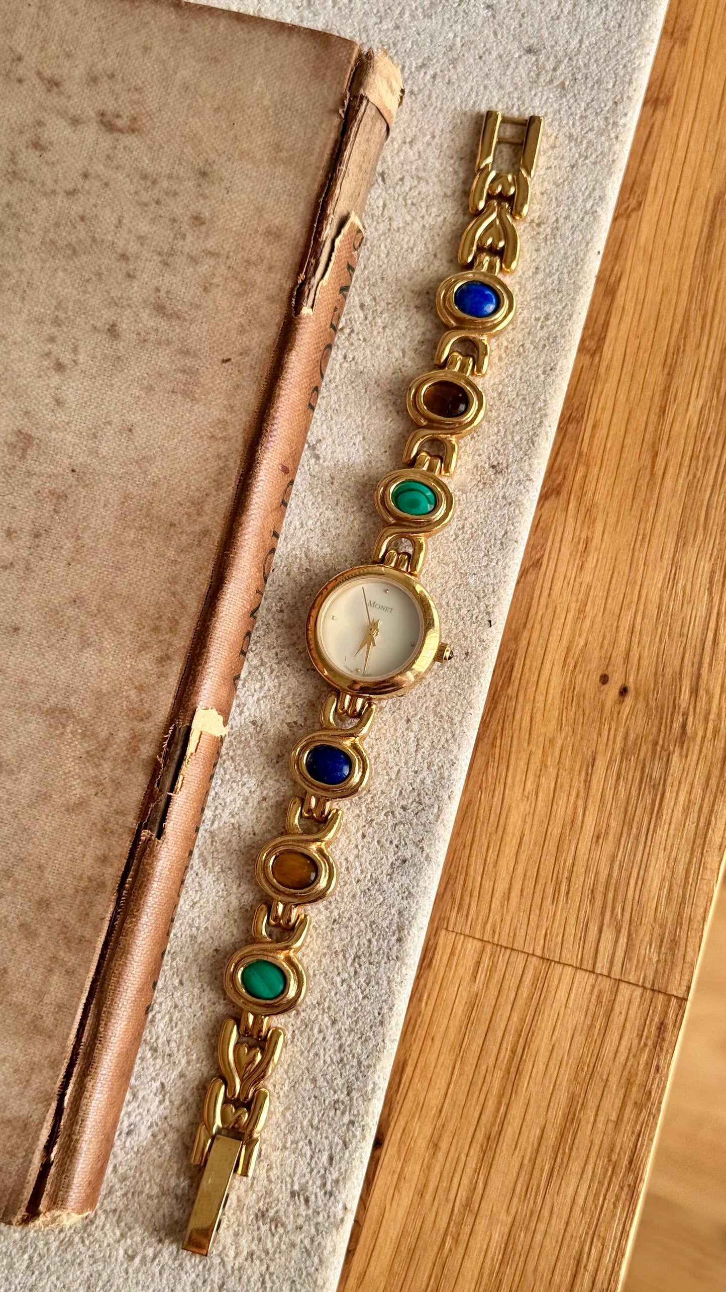 Monet vintage watch - gold plated, mother of pearl dial and adorned gemstones