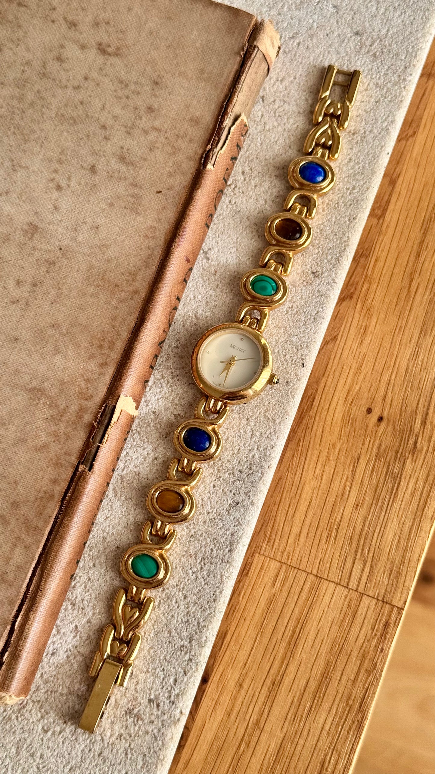Monet vintage watch - gold plated, mother of pearl dial and adorned gemstones