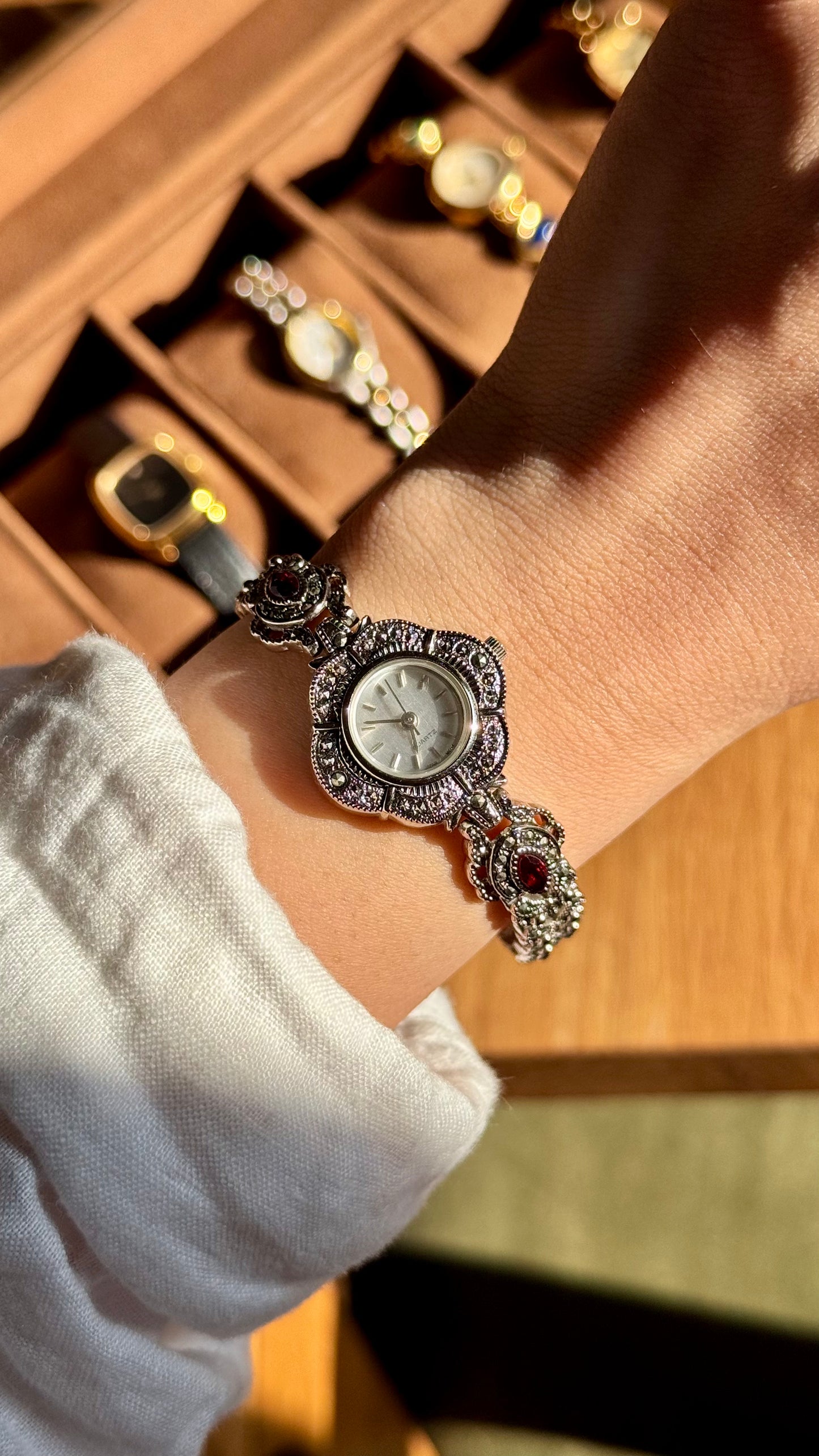 Art Deco Avon vintage watch - silver with marcasite, red gems