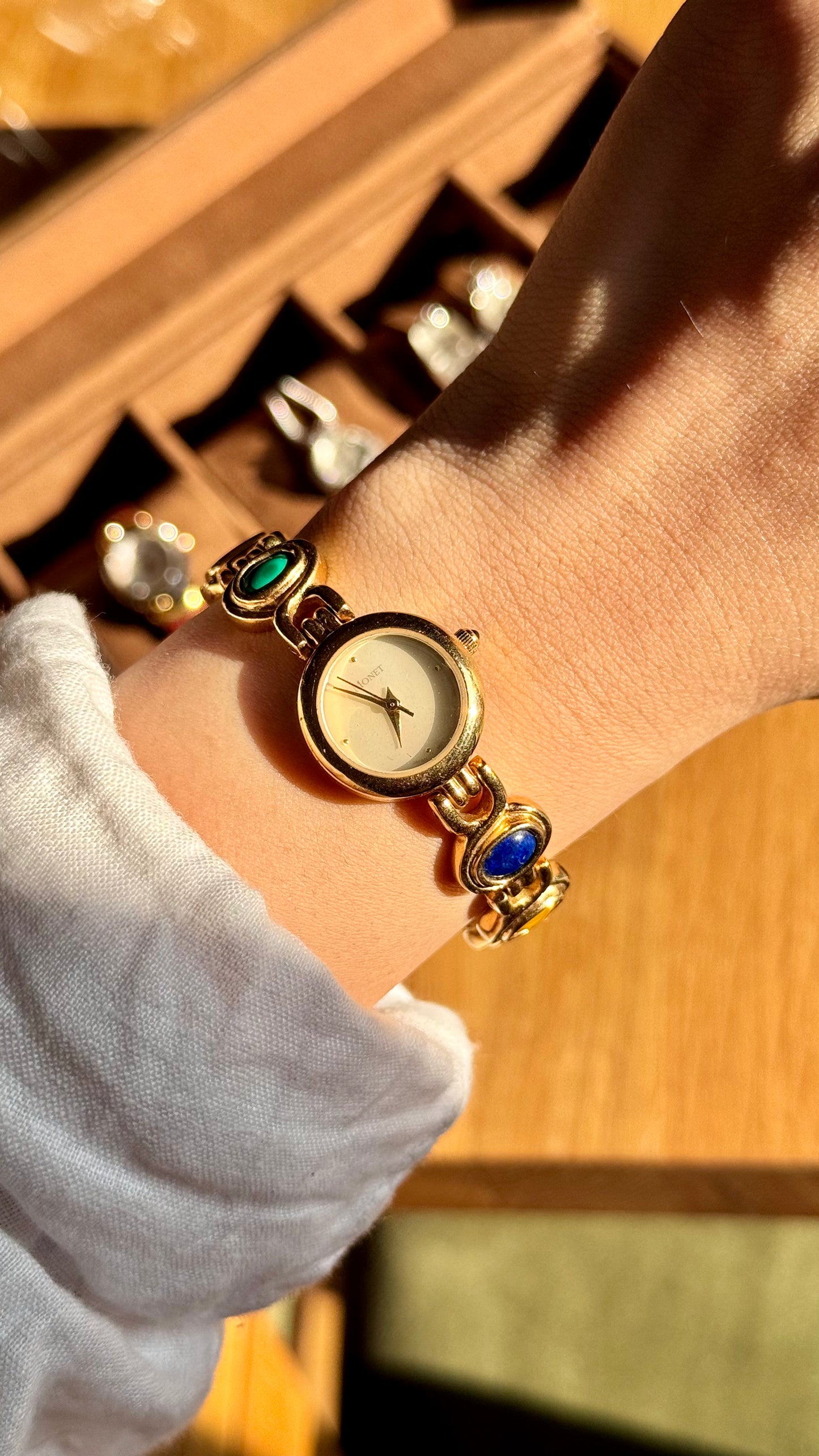 Monet vintage watch - gold plated, mother of pearl dial and adorned gemstones