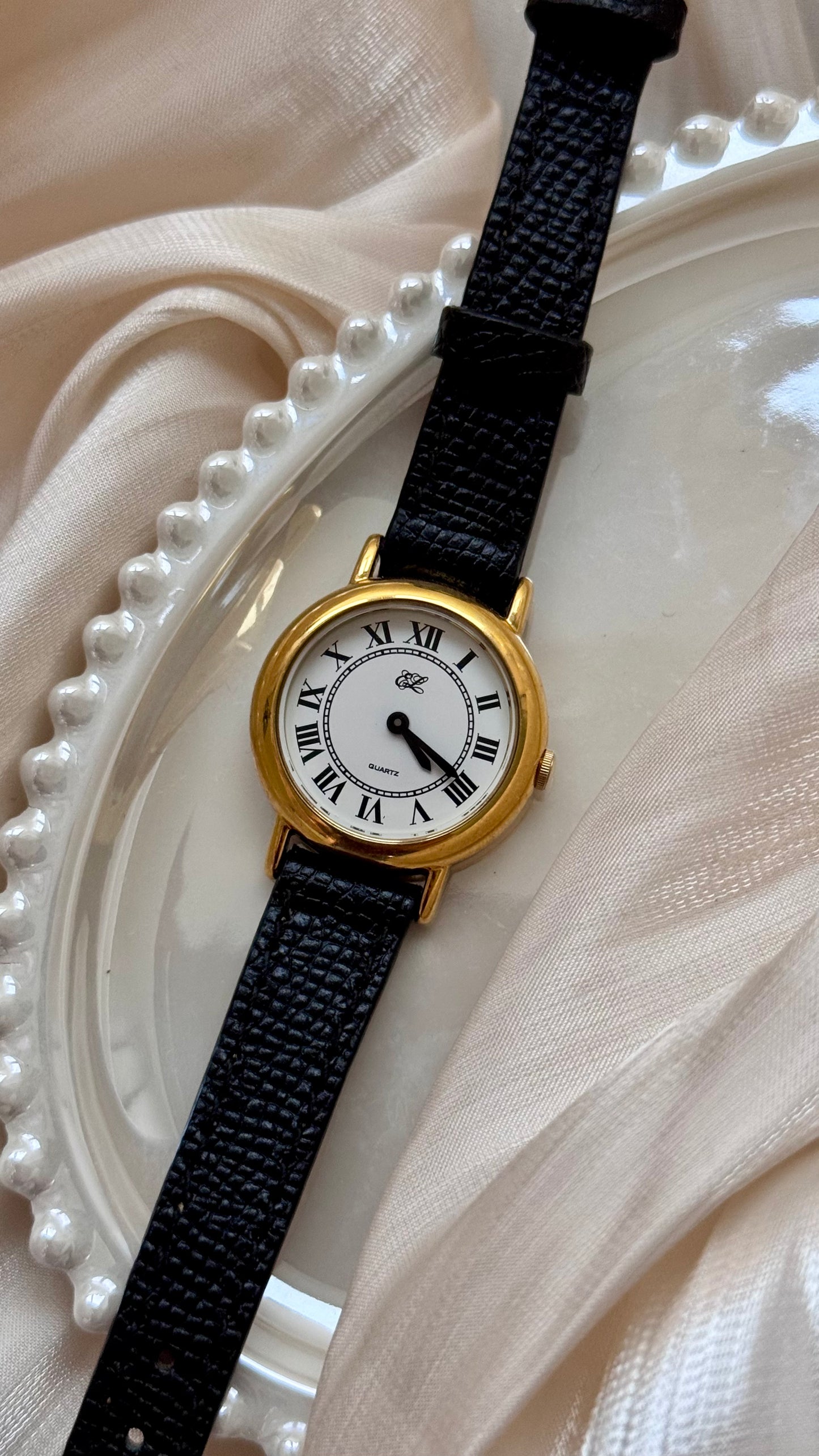 Estee Lauder vintage watch - Roman numerals, gold plated