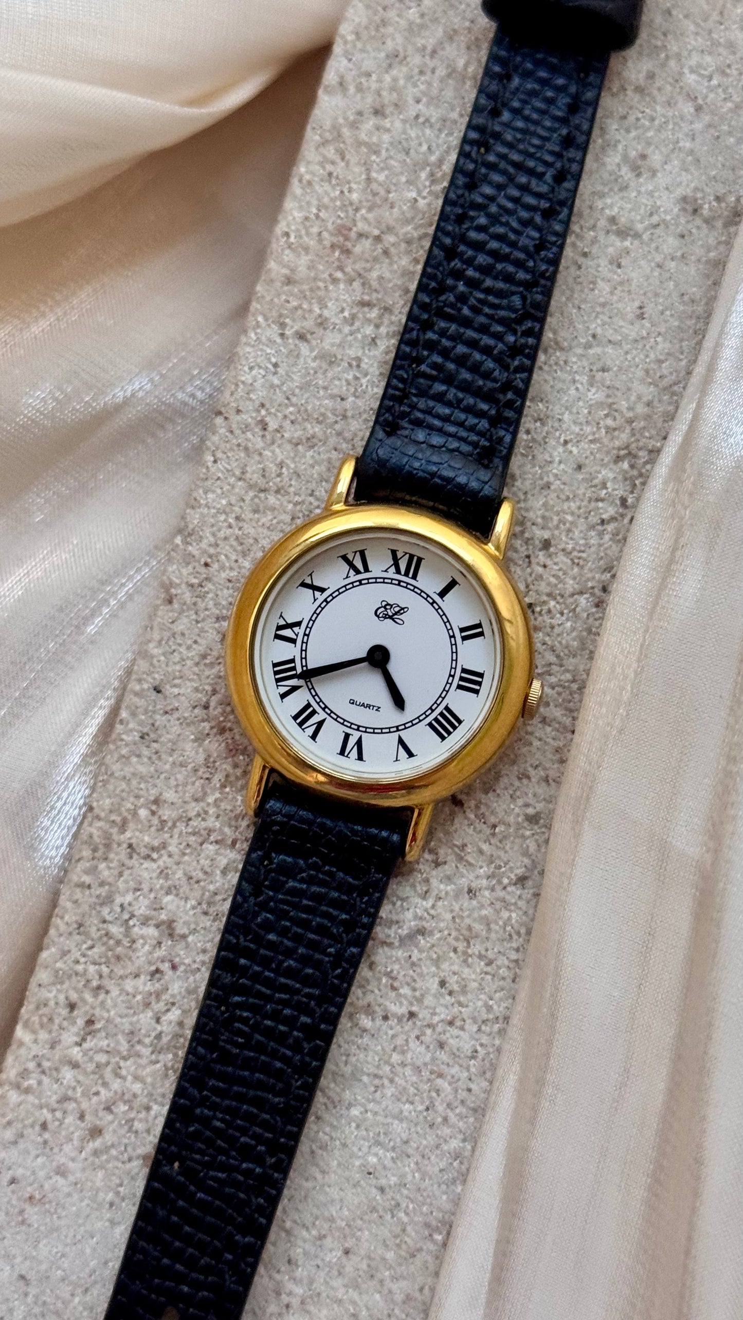 Estee Lauder vintage watch - Roman numerals, gold plated