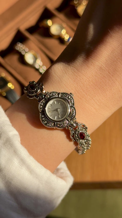 Art Deco Avon vintage watch - silver with marcasite, red gems