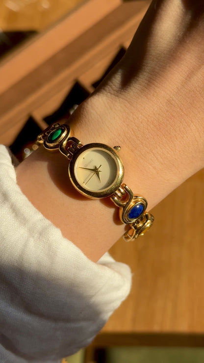 Monet vintage watch - gold plated, mother of pearl dial and adorned gemstones
